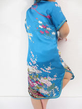 Kinderjurk bloemen turquoise