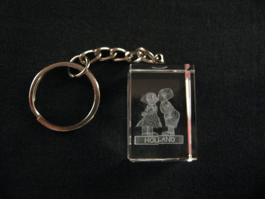 Kristallener Schlsselanhnger Junge en Mdchen auf Holzschuhen