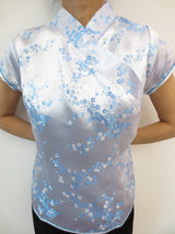 licht blauw met bloemen - 40