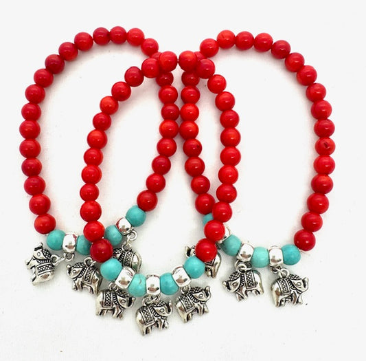 Rotes Korallenarmband met 3 Elefantenanhängern