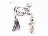 Grijse "SUCCESS" Angel Sleutelhanger met Tassel