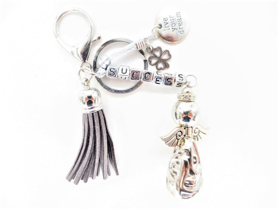 Grijse "SUCCESS" Angel Sleutelhanger met Tassel